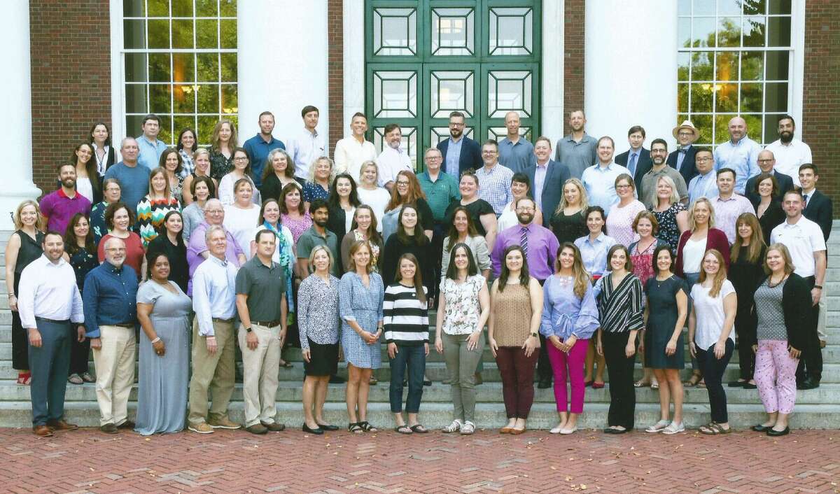 New Canaan High School teachers attended a Harvard Case Method Project training workshop Aug. 18-20, at Cambridge, Mass. Top row, eighth from left: Paul Phillips; 12th from left, Professor David Moss. Fourth row, 10th from left: Amy Rothschild.
