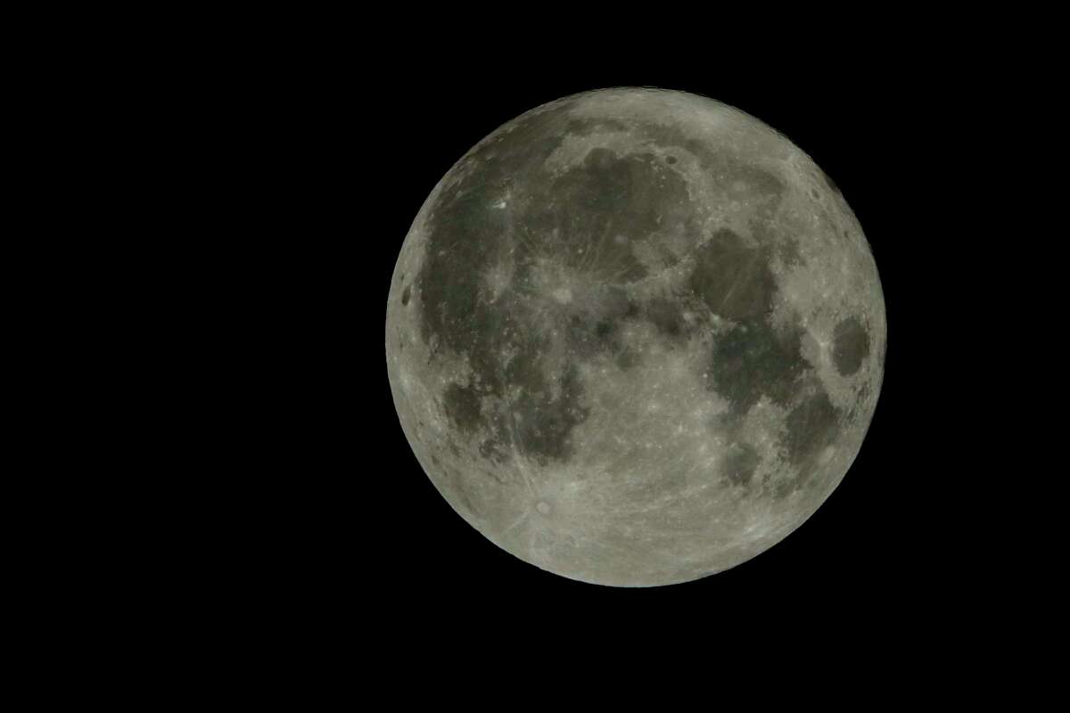 The full harvest moon is seen Friday, Sept. 13, 2019.