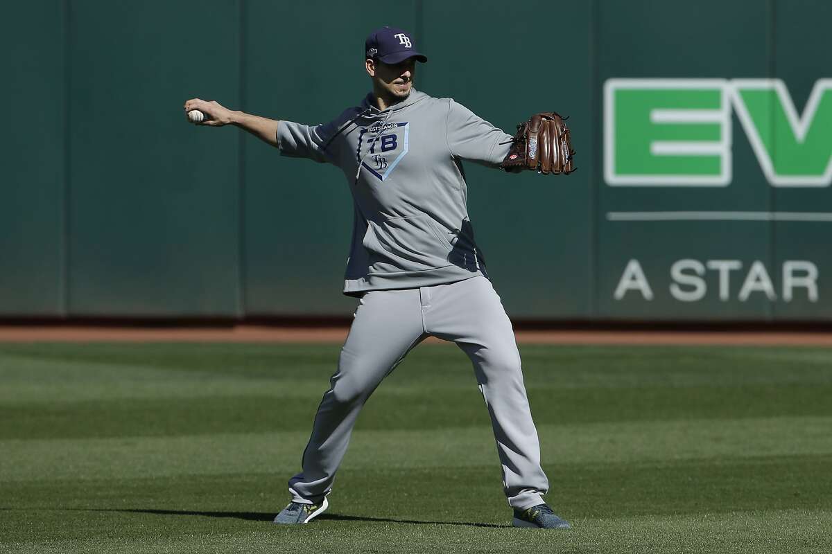 Tampa Bay Rays pitcher Charlie Morton throws during baseball practice in Oakland, Calif., Tuesday, Oct. 1, 2019. The Rays are scheduled to face the Oakland Athletics in an American League wild-card game Wednesday, Oct. 2. (AP Photo/Jeff Chiu)