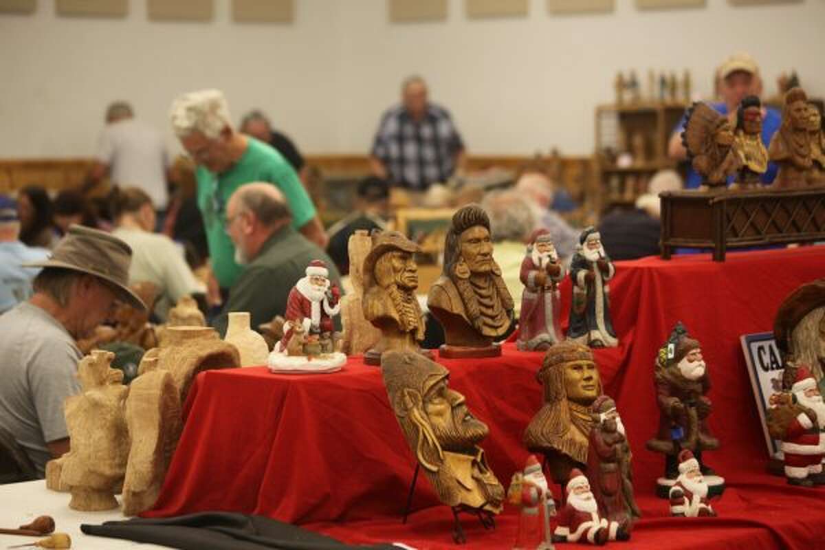 The 19th annual Woodcarvers Roundup in Evart drew veteran and novice woodcarvers from across the country who wanted to try their hand at the craft. The event included vendors and instructors teaching visitors how to make different carvings. (Herald Review photos/Taylor Fussman)