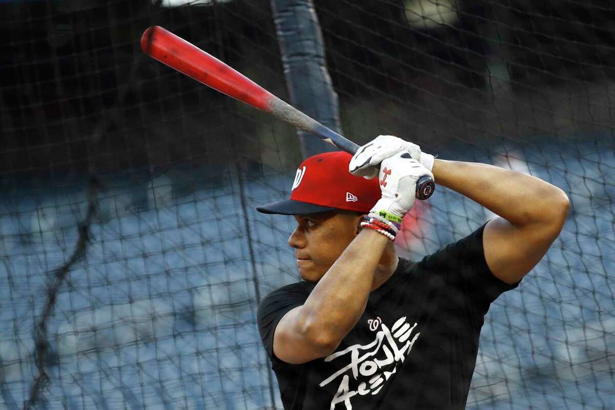 Washington Nationals' Juan Soto participates in batting practice before a National League wild card baseball game against the Milwaukee Brewers, Tuesday, Oct. 1, 2019, in Washington.
