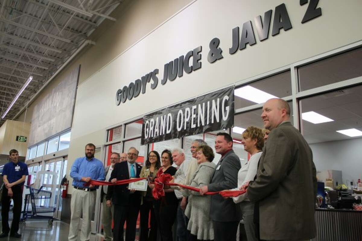 Benishek, Huizenga snowmobile through Manistee County