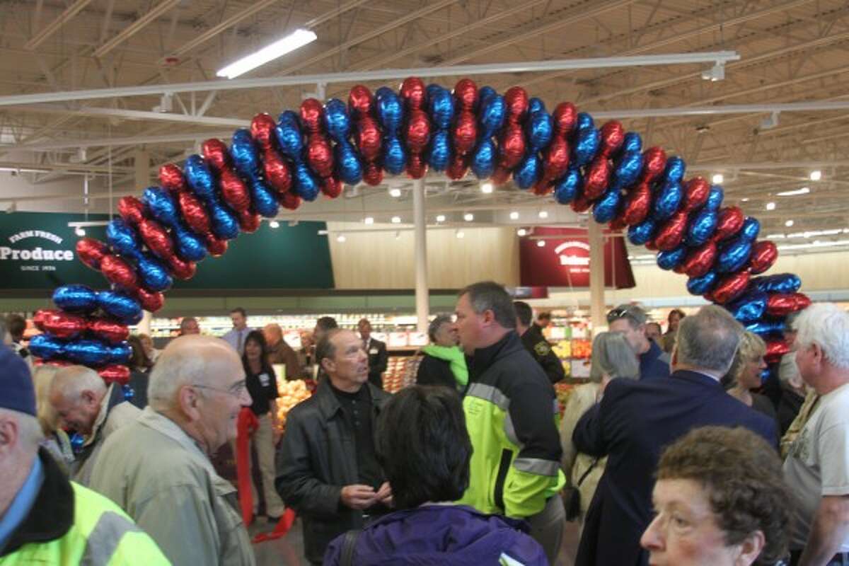 Members of the Manistee community gathered for the ceremonial ribbon cutting officially opening the Manistee Meijer in Manistee Township on Thursday. (Justine McGuire/News Advocate)