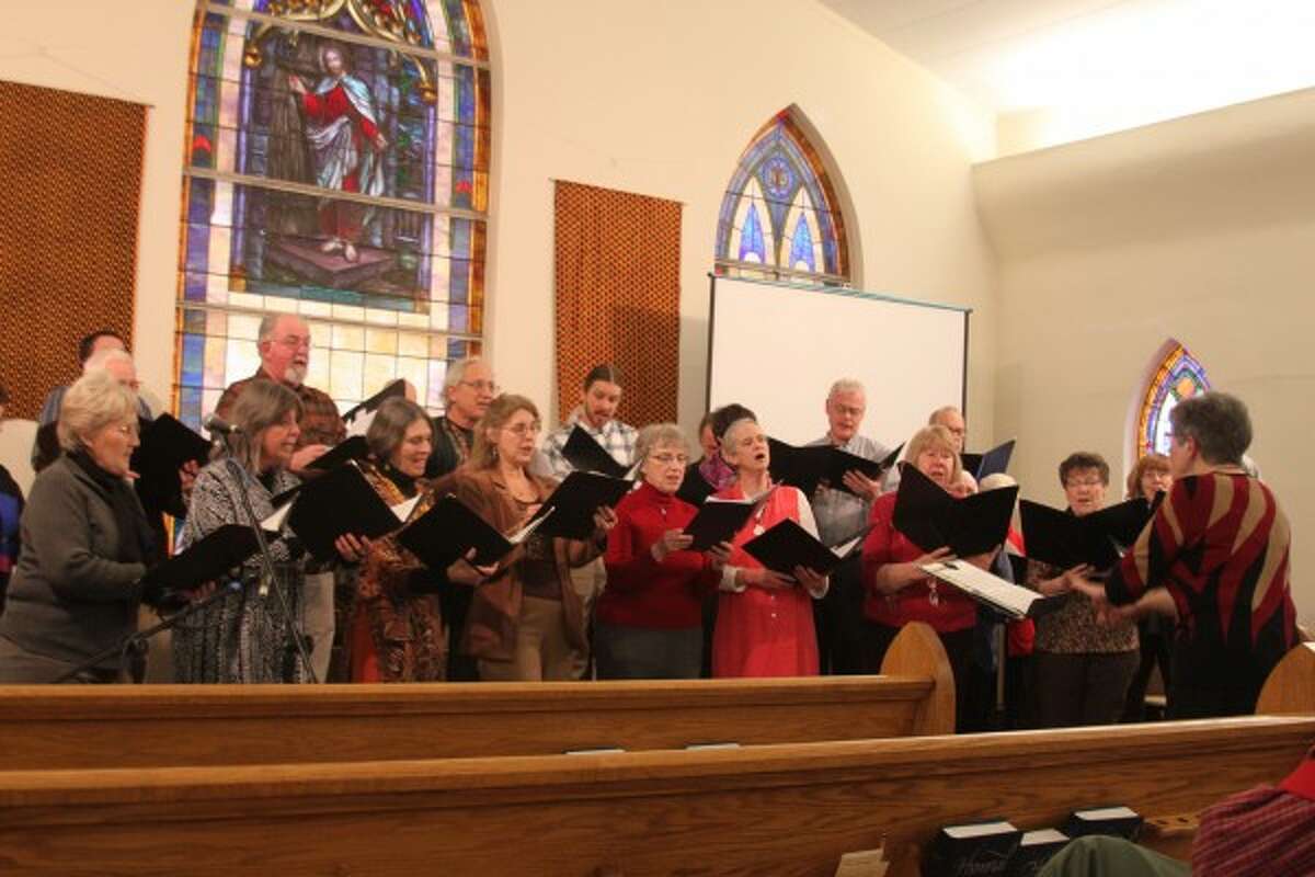 Photo by Sean Bradley / News Advocate Members of the Manistee Choral Society, the Lakeview Church of the Brethren choir and others (pictured) joined together to sing songs Saturday at the Onekama Church of the Brethren in Onekama.
