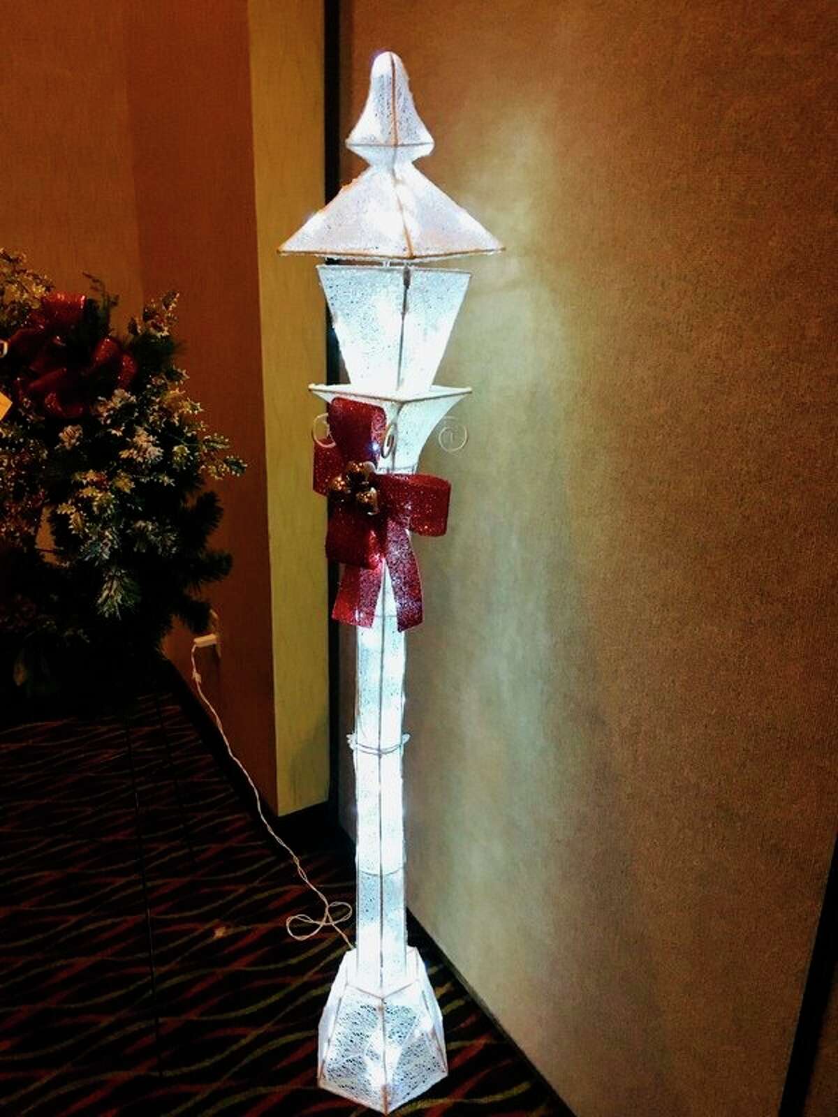 Unique holiday décor like this ornate lamppost will be created and donated to the Festival of Trees fundraising auction that will occur Nov. 6. (Courtesy photo)