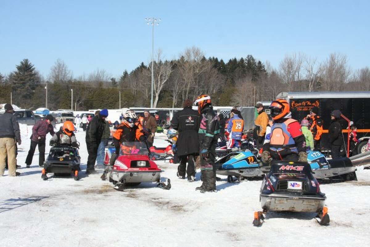 Snowmobilers from all over the state took part in races Saturday. Many had trailers and all of them had gear including helmets and gloves to protect themselves during races. (Sean Bradley/News Advocate)