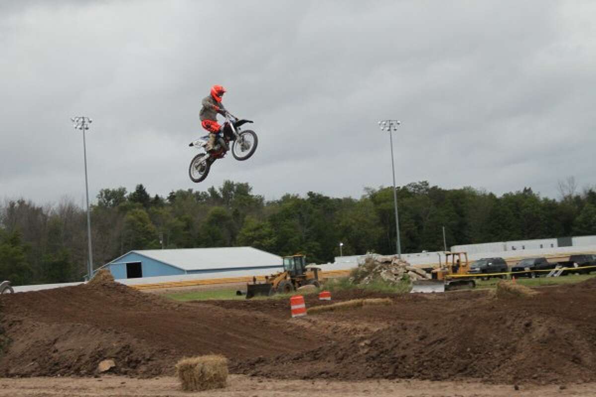 SJO Motocross brought a fair amount of high-flying riders to the fairgrounds on Tuesday evening. (Logan T. Hansen/ News Advocate)