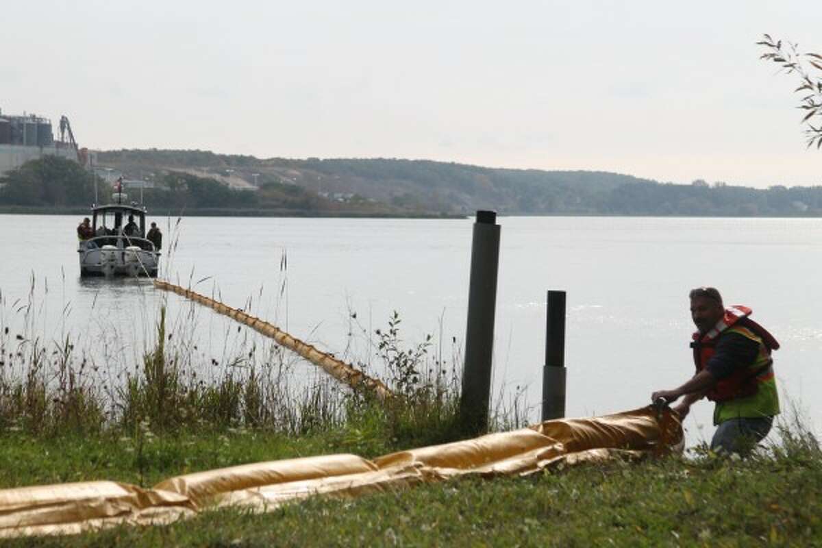 During the port security drill Monday at Rieth Riley Construction in Manistee, 1,000 feet of boom — a net that attaches to a boat to control a spill in water — was deployed after it was attached to a boat. (Sean Bradley/News Advocate)