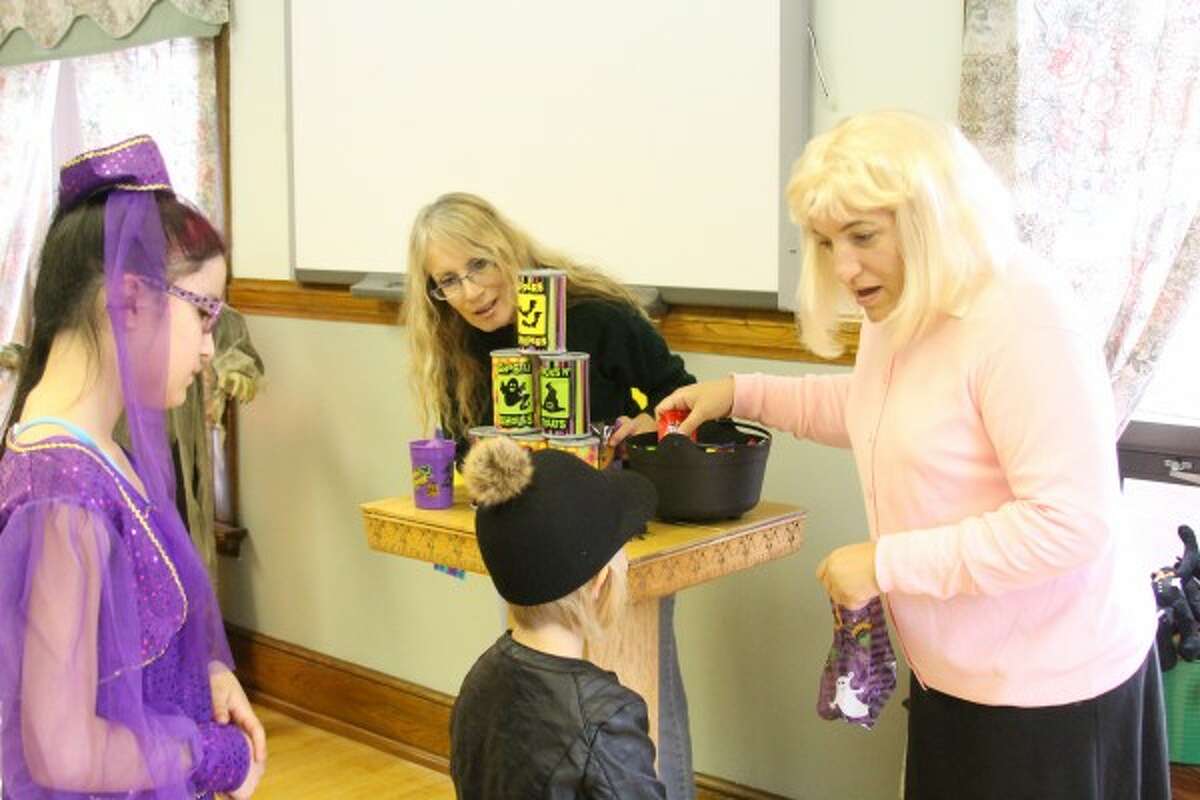 Candy was handed out to children Saturday who attended the Manistee County Library's annual Halloween party. (Sean Bradley/News Advocate)