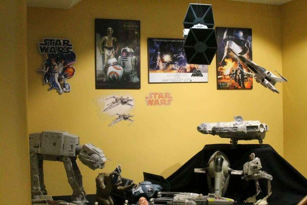 The theatre hosts a display of different "Star Wars" action figures and toys. (Sean Bradley/News Advocate)