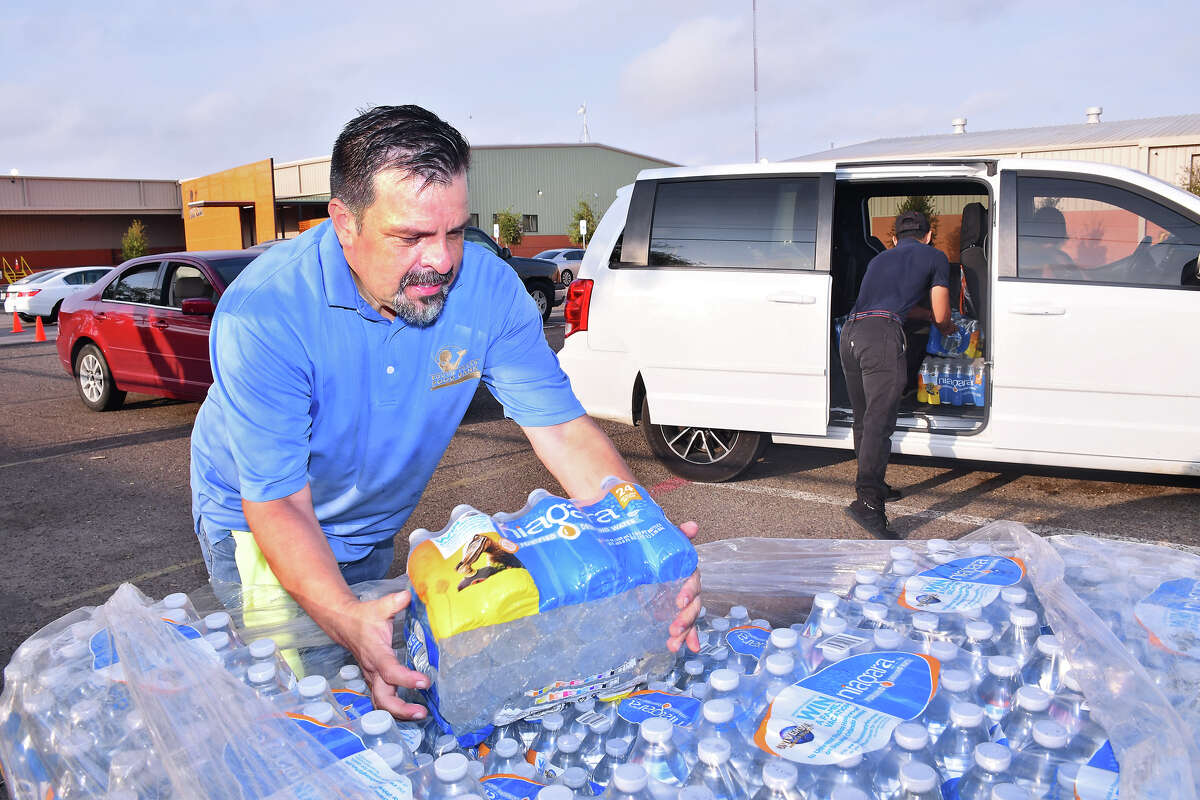 The South Texas Food Bank distributed free cases of water, Monday, September 30, 2019, to residents in response to the city-wide boil-water notice.