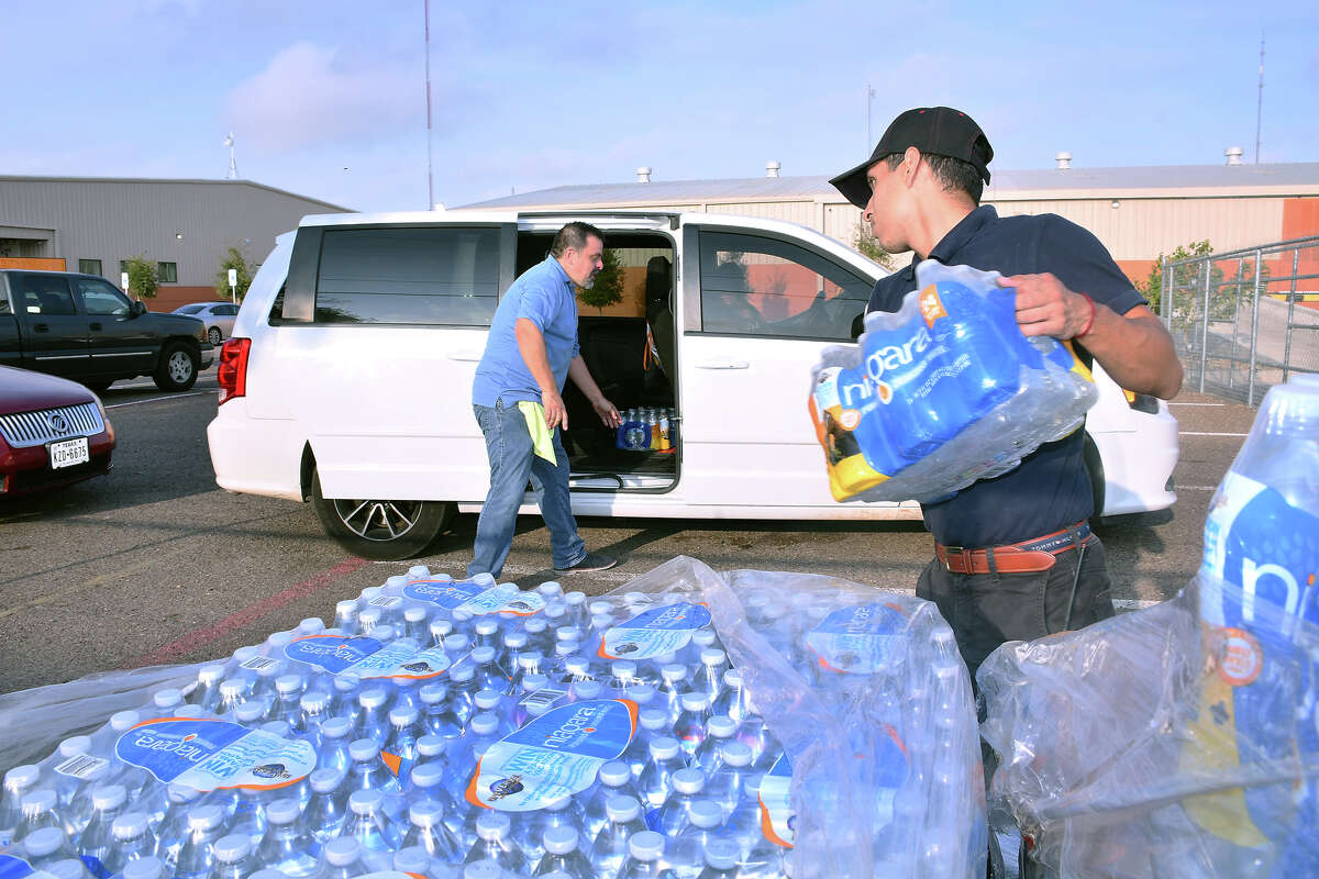 The South Texas Food Bank distributed free cases of water, Monday, September 30, 2019, to residents in response to the city-wide boil-water notice.