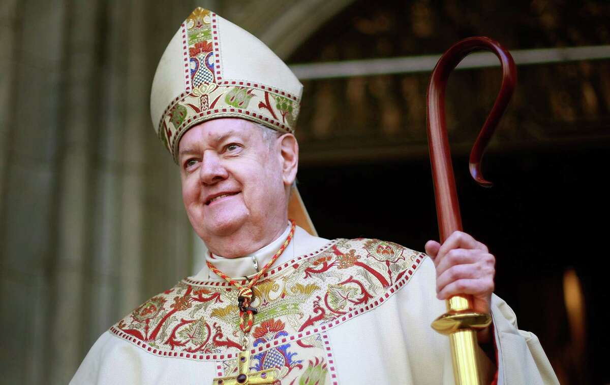 Cardinal Edward Egan smiles to the crowd gathered outside St. Patrick’s Cathedral after celebrating his final Easter mass as archbishop of the Roman Catholic Archdiocese of New York in 2009.