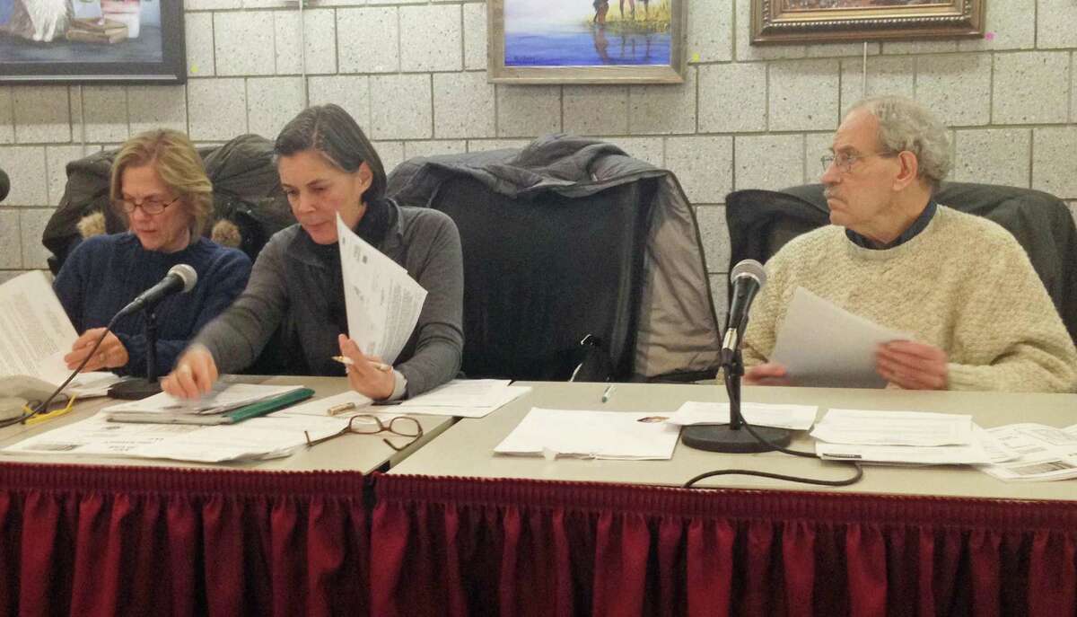In this file photo Chairman Bruce Tyler, far right, and commission members Chantal Foster, center, and left, Carolyn Free, and the Elmcrest proposal in Portland.