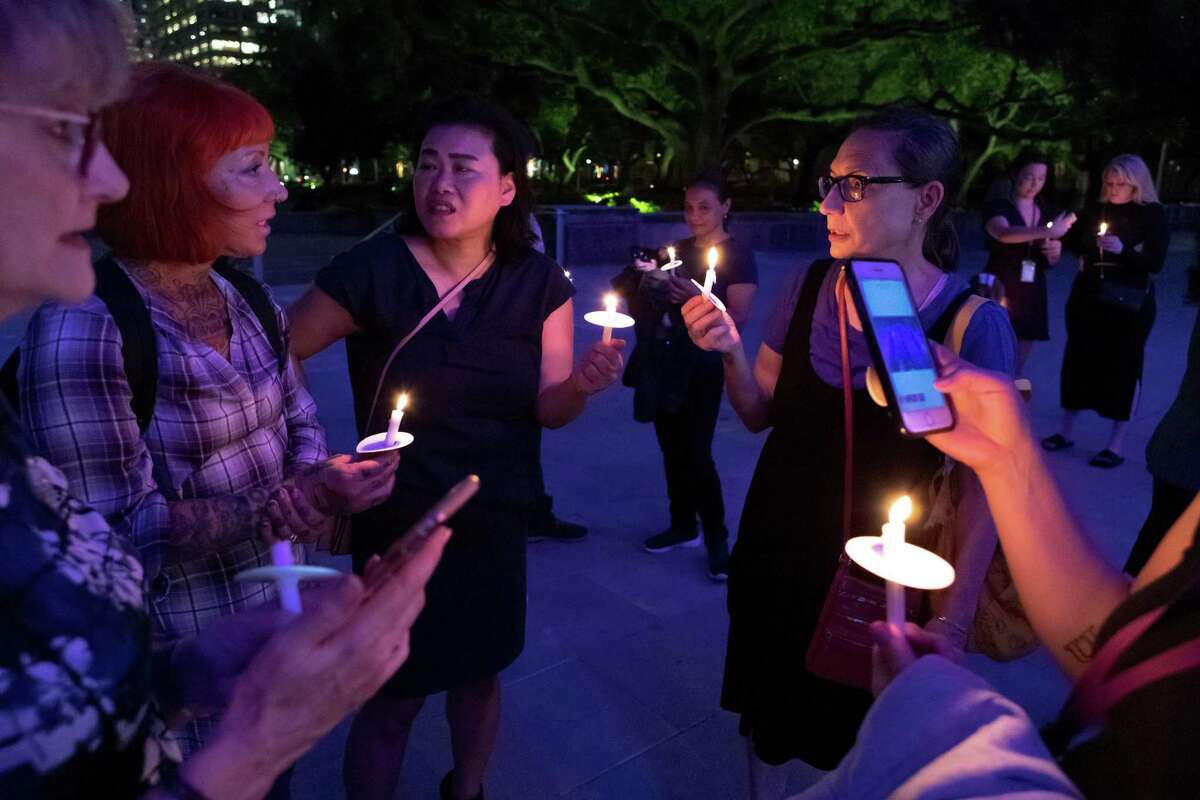 The Houston Area Women's Center hosted a candle-it vigil at City Hall to raise awareness about domestic violence Monday, Sep 30, 2019, in Houston.