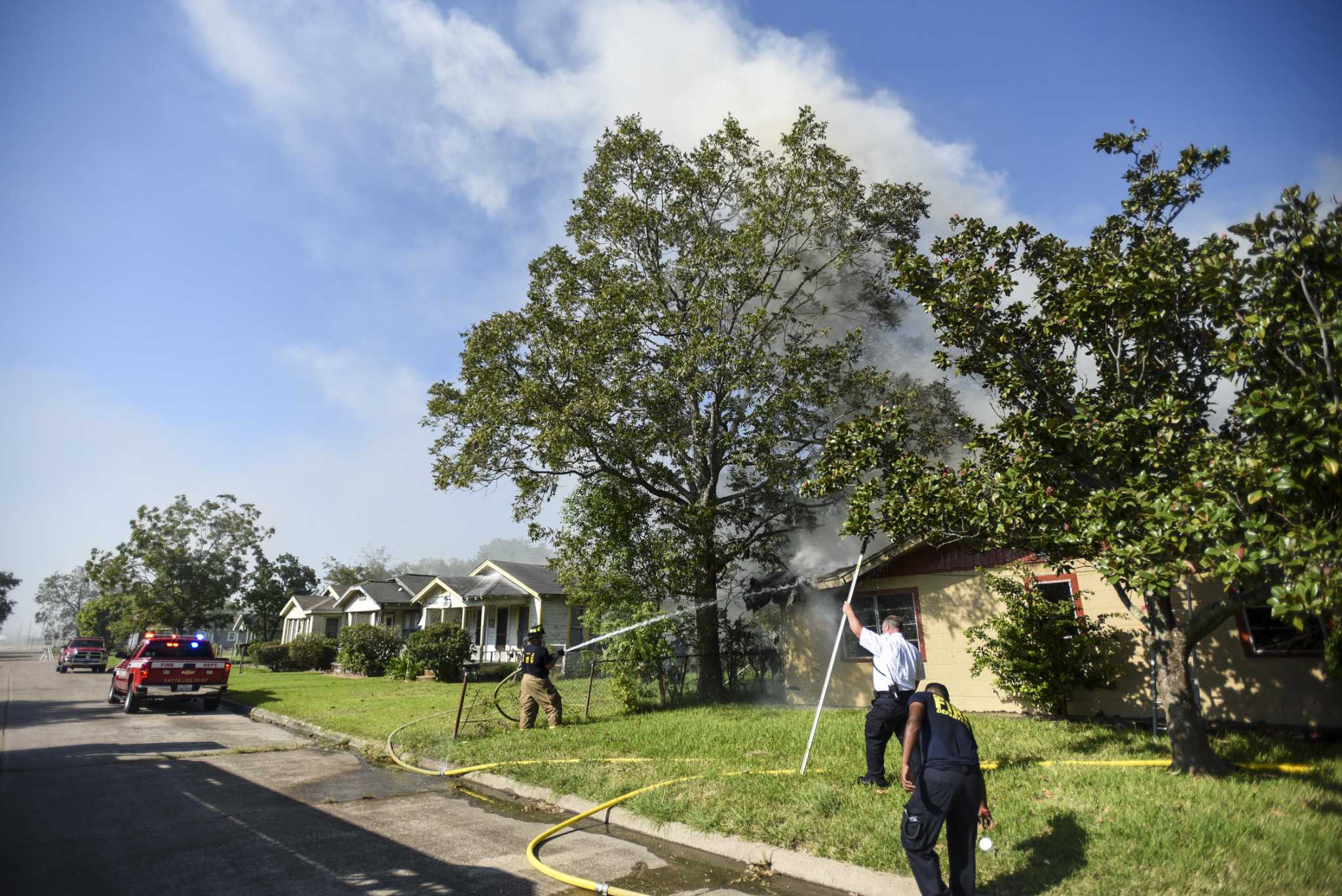 Photos: Firefighters extinguish blaze at abandoned house