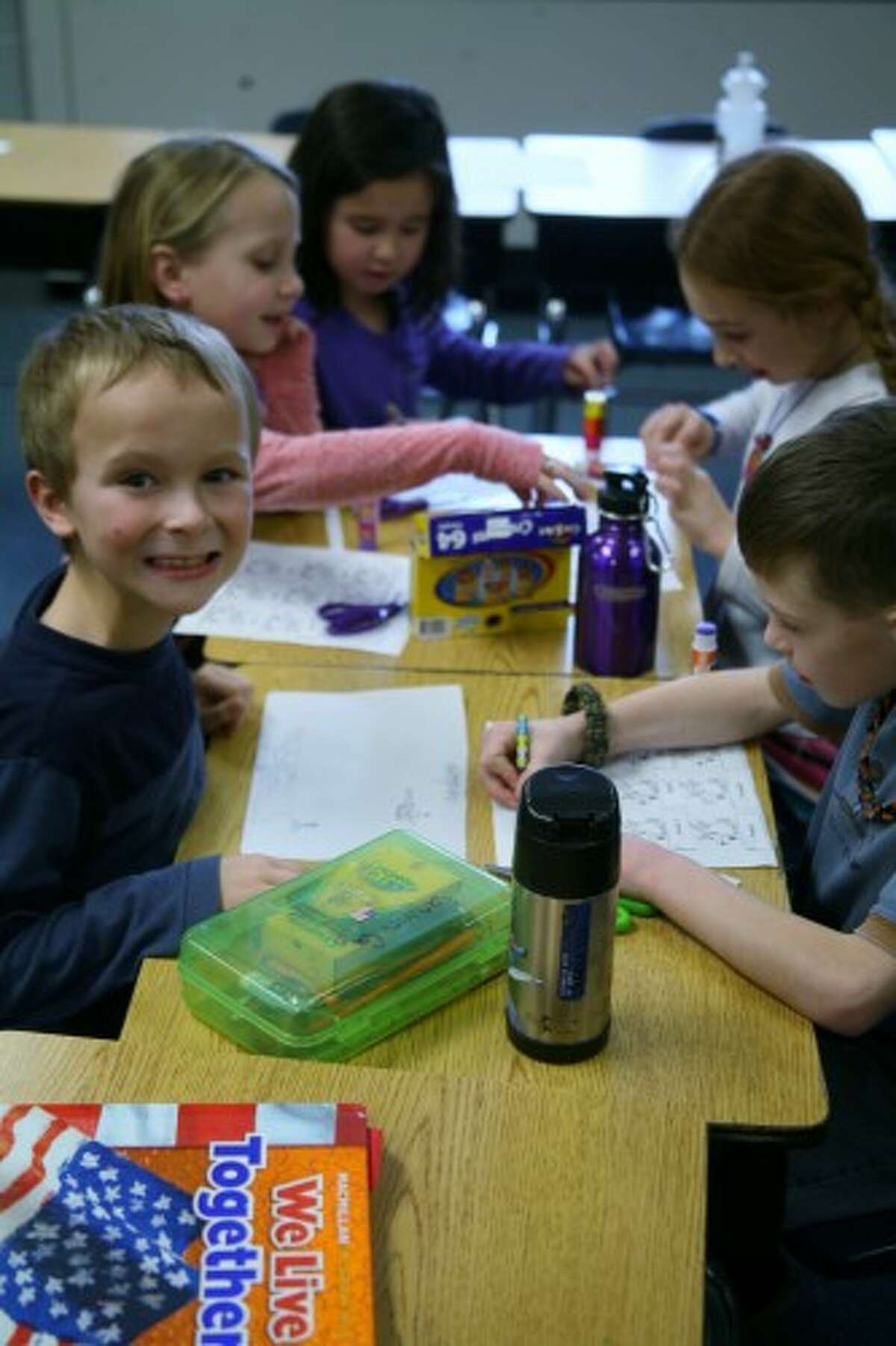 ALPHABETICAL: Second-grade students in Karen King’s class at Brookside Elementary School work on an exercise on Thursday putting reindeer in alphabetical order by name. (Pioneer photos/Lauren Fitch)