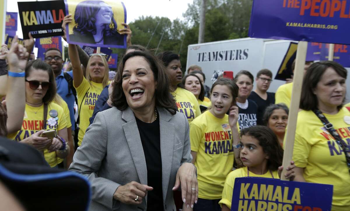 Democratic presidential candidate Sen. Kamala Harris, D-Calif. marches with her supporters at the Polk County Democrats Steak Fry, in Des Moines, Iowa, Saturday, Sept. 21, 2019. (AP Photo/Nati Harnik)