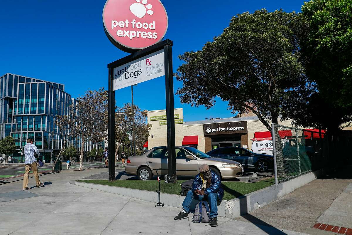 Homeless man Dedawn Ali, 71, sits on the corner of Clinton Park in San Francisco, California, on Tuesday, Oct. 1, 2019. Residents living along Clinton Park pooled their money to buy a set of large rocks and had them placed along the sidewalks. Residents complained of homeless encampments creating noise and disturbances along the block.