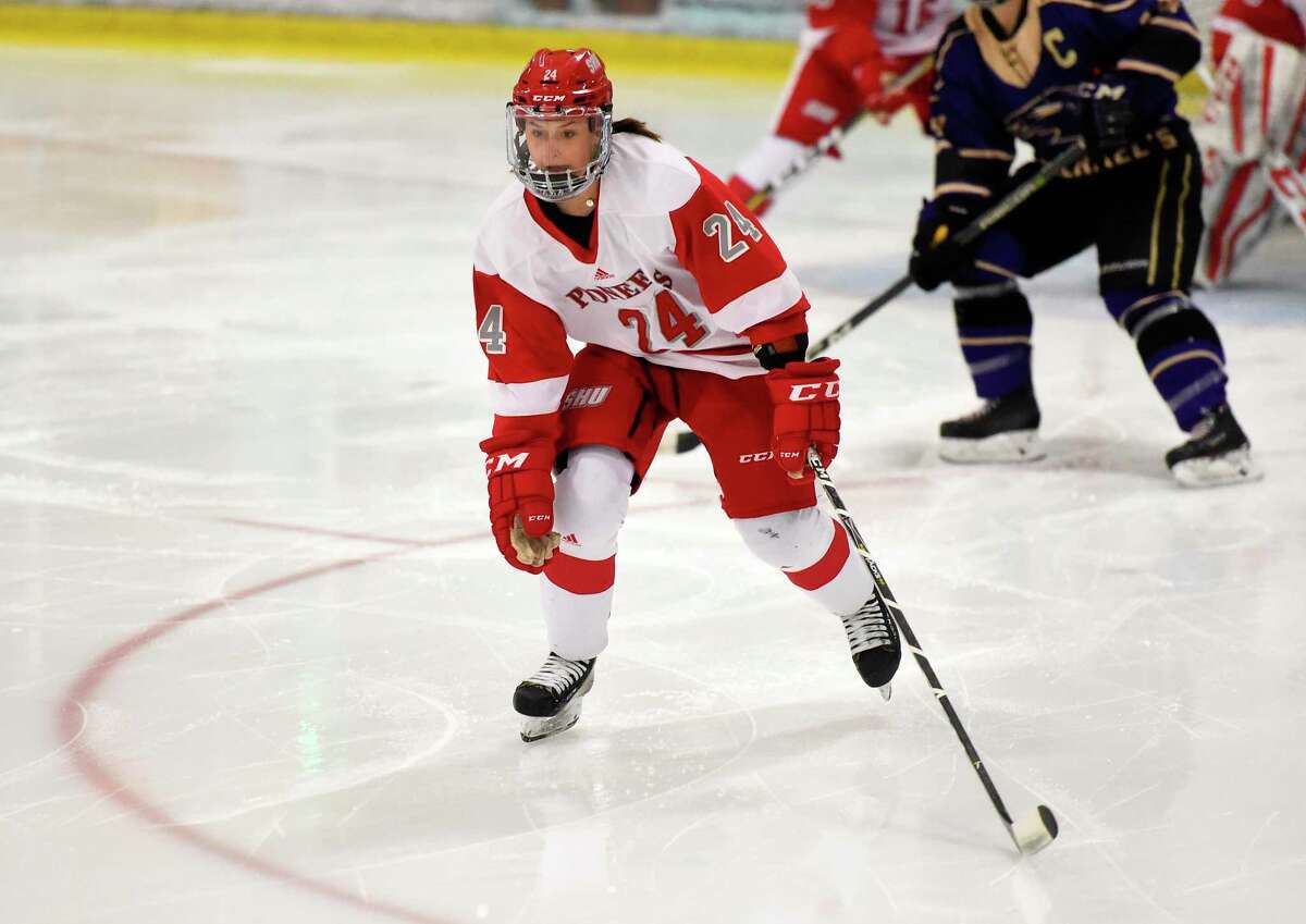 Sacred Heart hockey player Jayne Lewis became the program’s all-time leading scorer