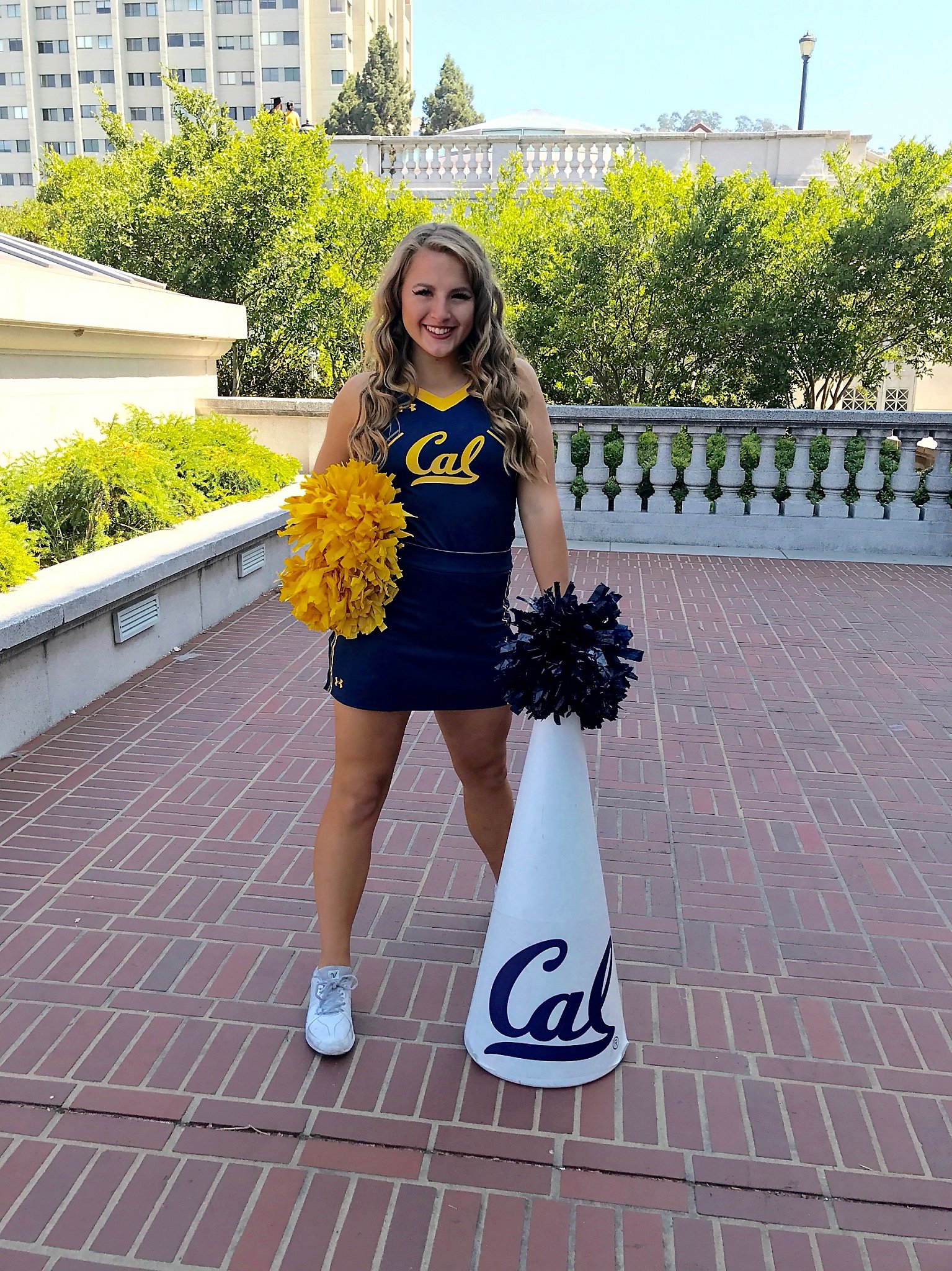 Former UC Berkeley cheerleader says she was forced to perform despite concussions photo