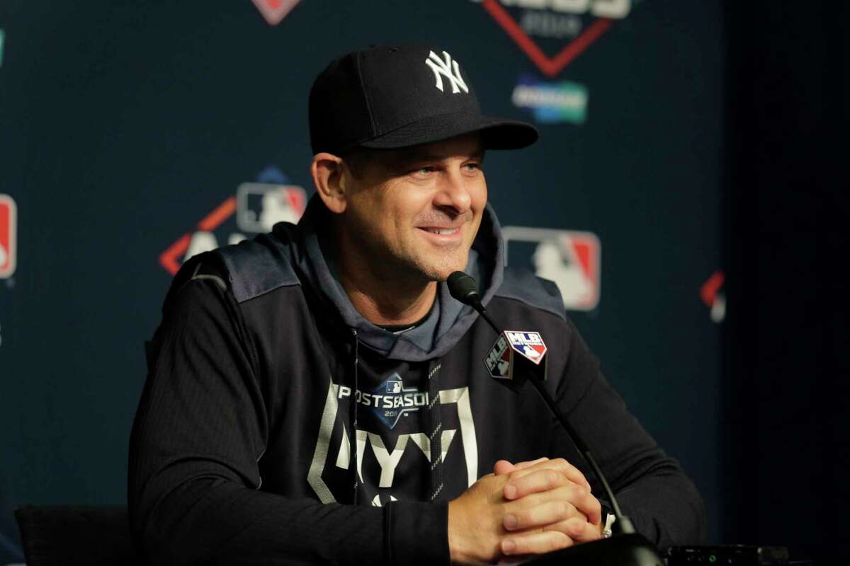 New York Yankees manager Aaron Boone talks to reporters at a news conference before a workout at Yankee Stadium, Thursday, Oct. 3, 2019, in New York. The Yankees will host the Minnesota Twins in the first game of an American League Division Series on Friday. (AP Photo/Seth Wenig)