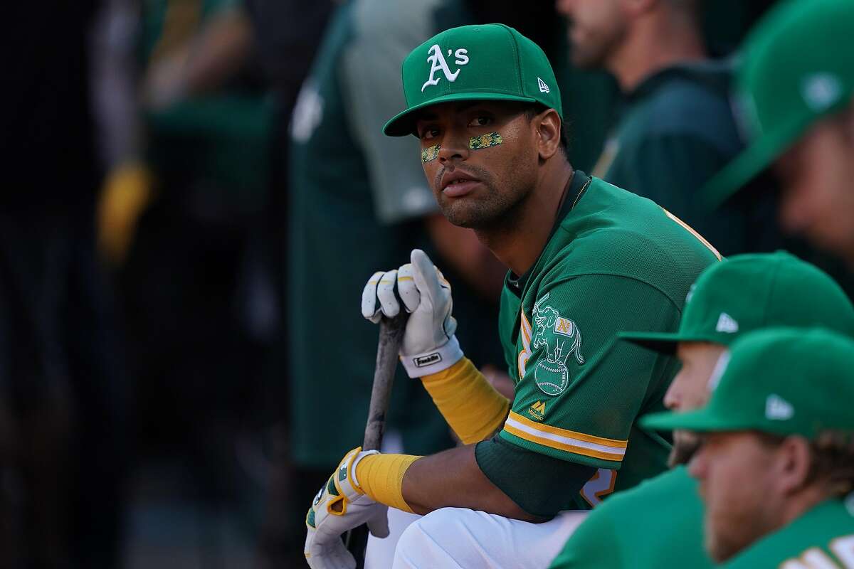 OAKLAND, CALIFORNIA - OCTOBER 02: Khris Davis #2 of the Oakland Athletics looks on from the dugout during the American League Wild Card Game against the Tampa Bay Rays at RingCentral Coliseum on October 02, 2019 in Oakland, California. (Photo by Thearon W. Henderson/Getty Images)