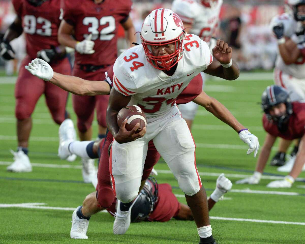 Ron Hoff (34) of Katy scores a touchdown during the second quarter of a 6A Region III District 19 football game between the Katy Tigers and the Tompkins Falcons on Thursday, October 3, 2019 at Legacy Stadium, Katy, TX.