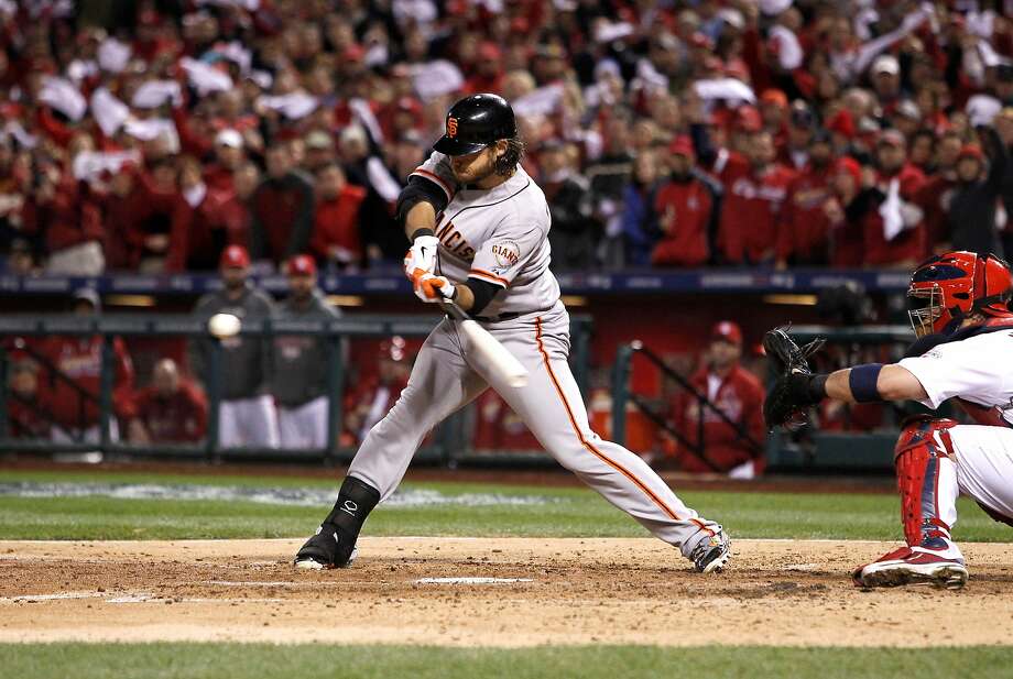 Giants' Brandon Crawford singles in two runs in the fouth inning, as the San Francisco Giants take on the St. Louis Cardinals in game five of the National League Championship Series, on Friday Oct. 19, 2012 at Busch Stadium , in  St. Louis, Mo. Photo: Michael Macor / The Chronicle