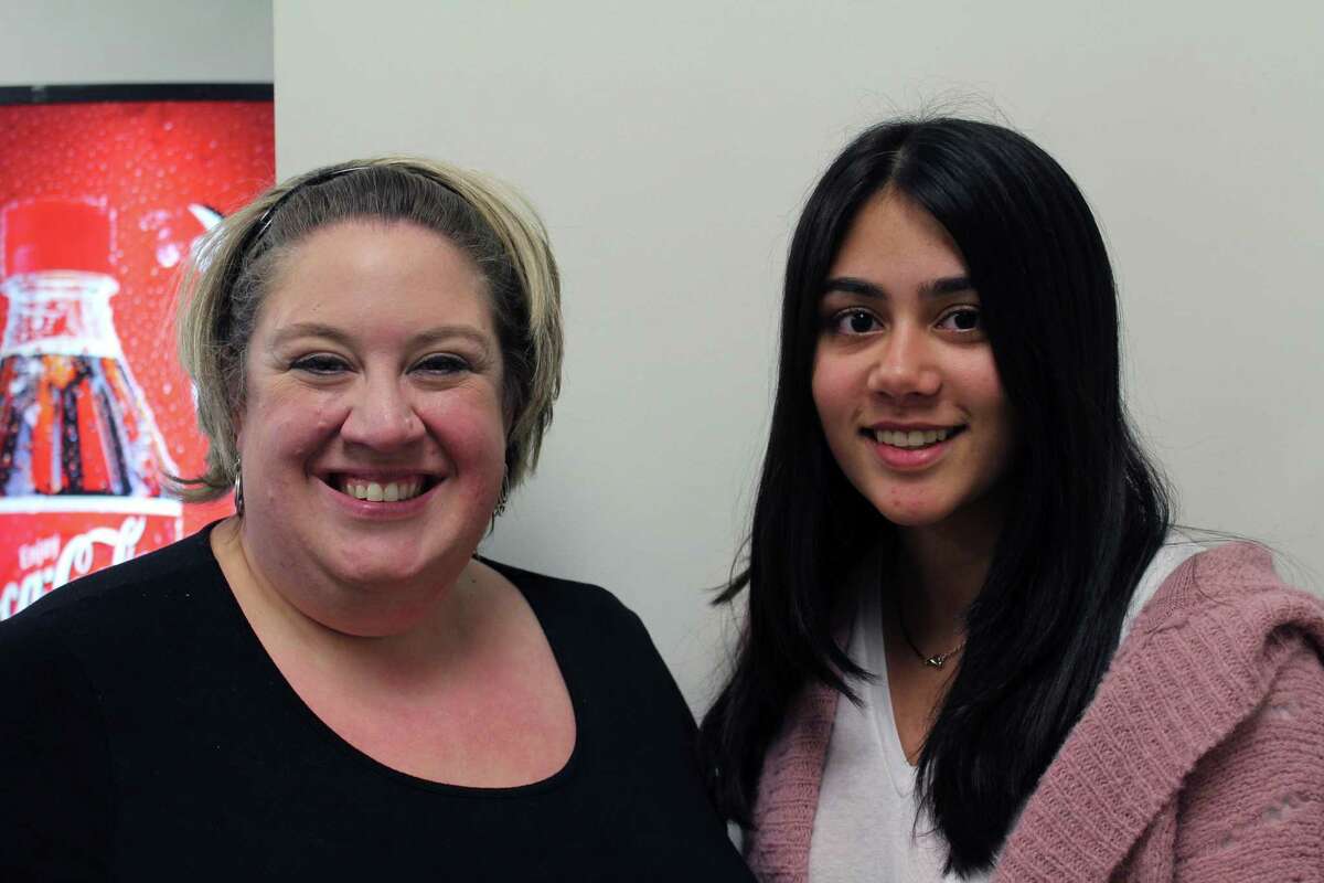 Volunteer Square Executive Director Julianne Alberty with the 2017 essay contest winner Reva Khan at Staples High School in Westport.