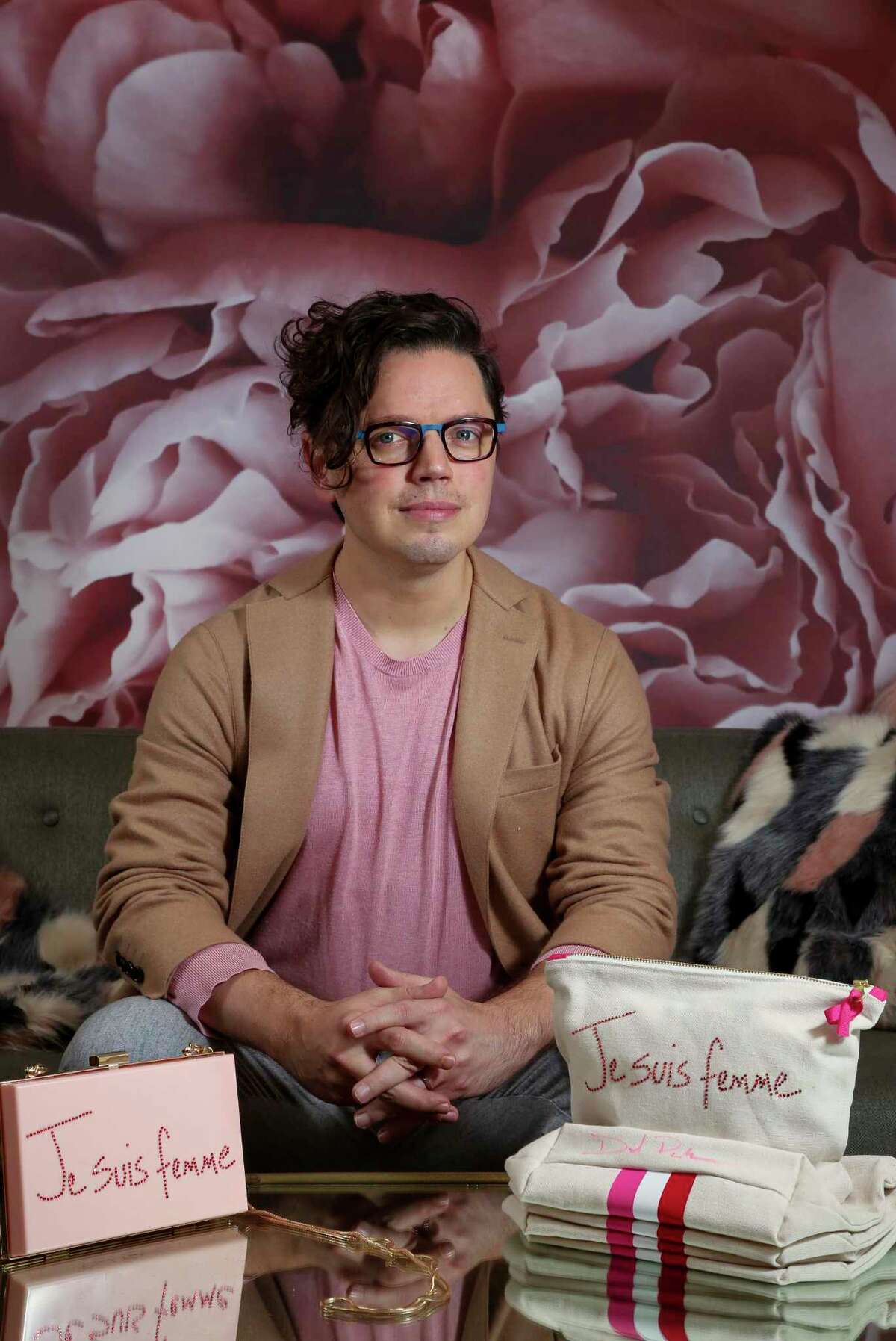 Houston fashion designer David Peck partnered with Susan G Komen Breast Cancer Houston on special-edition pink acrylic bags and travel pouches benefitting the organization.
