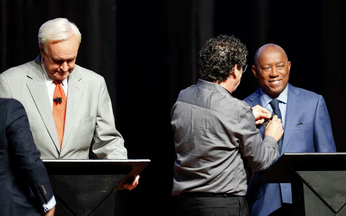 Houston Mayor Sylvester Turner gets his microphone turned on before a debate at the Hobby Center on Wednesday, Oct. 2, 2019. Along with Turner, the debate included Dwight Boykins, Tony Buzbee, Bill King, and Sue Lovell.