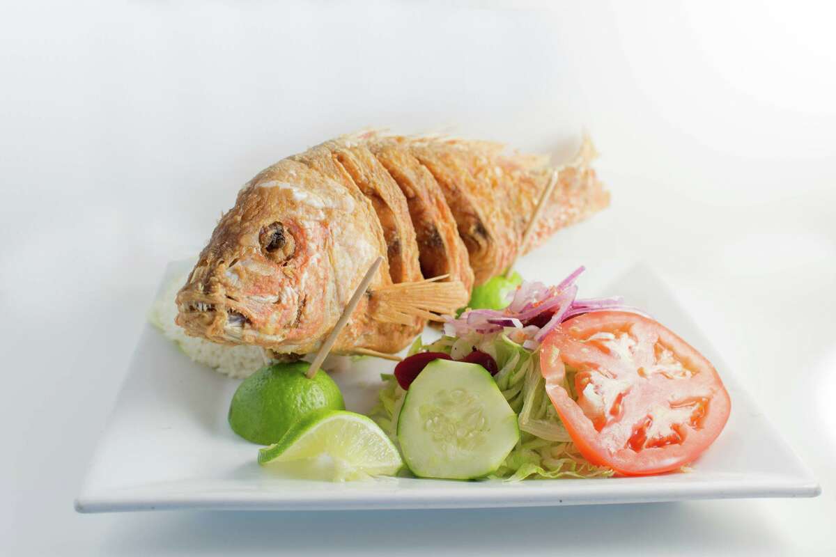 Entero Frito, a whole-fried fish, might look intimidating but is filled with flavor at Fiesta Limena.
