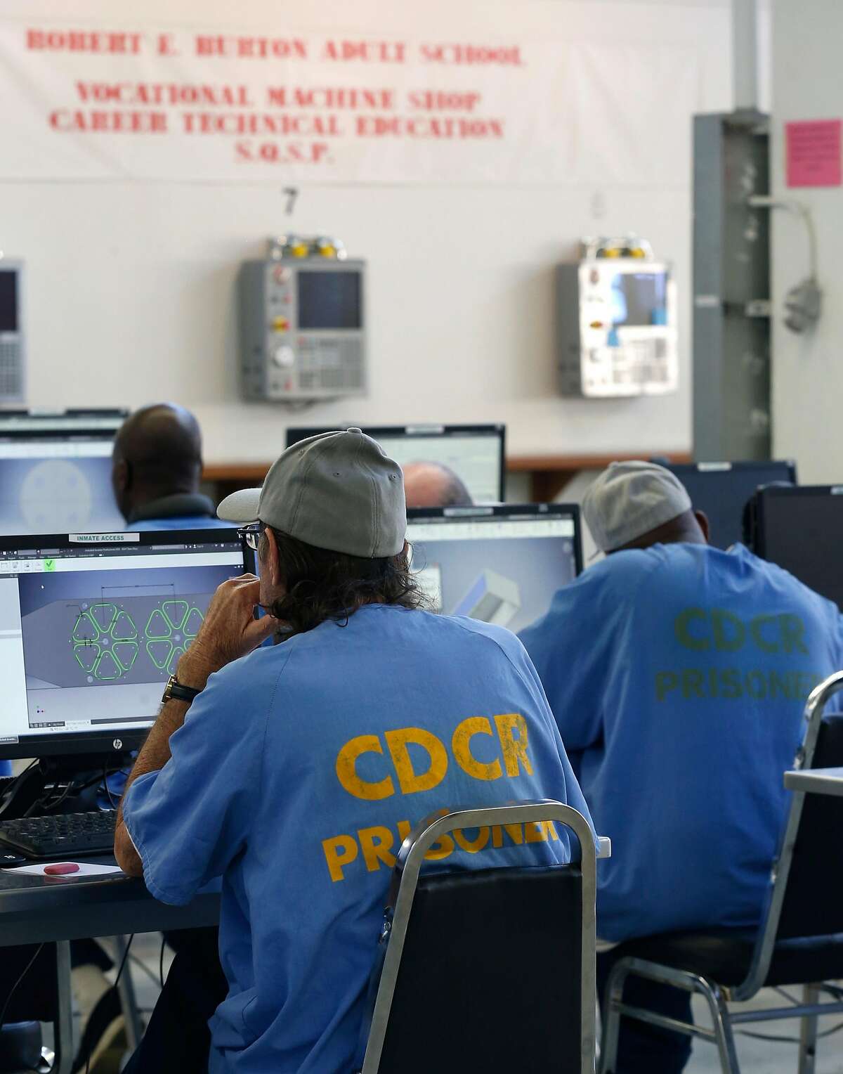 Inmate students use computers in a vocational machine shop class of the Robert E. Burton Adult School at San Quentin State Prison in San Quentin, Calif. on Thursday, Sept. 12, 2019. Burton has been designated as a "distinguished school," the first school within the California corrections system to achieve the honor.