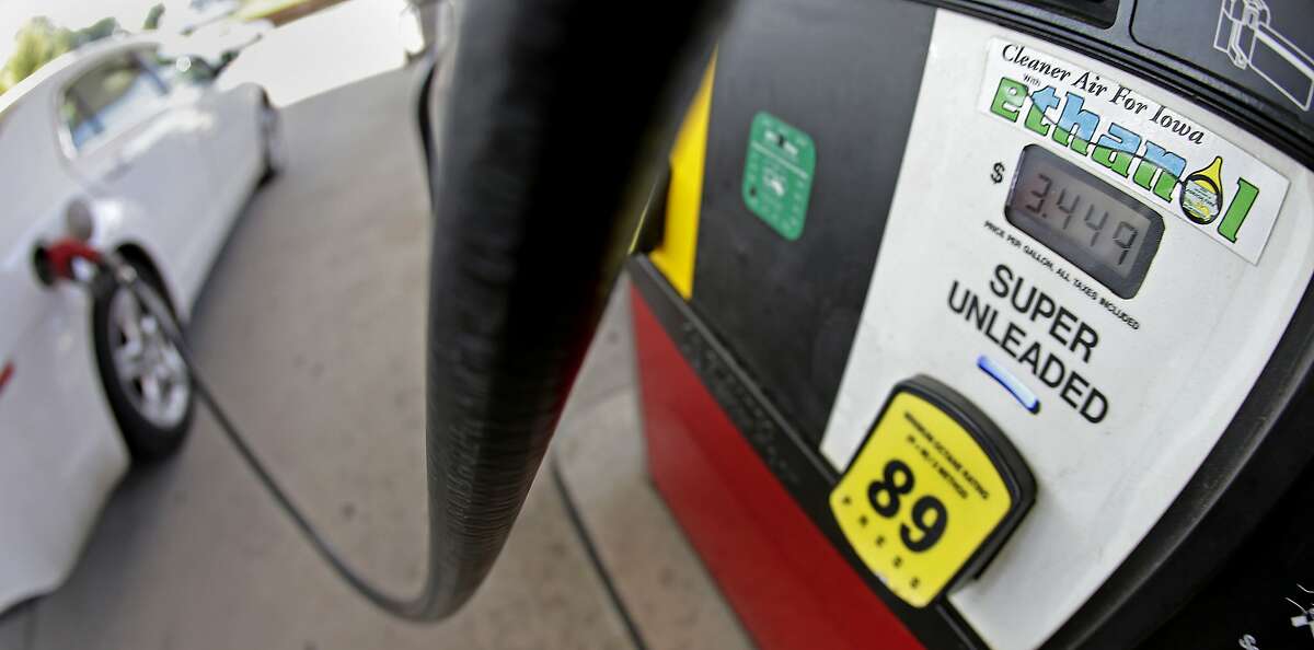 FILE - In this July 26, 2013, file photo, a motorist fills up with gasoline containing ethanol in Des Moines.