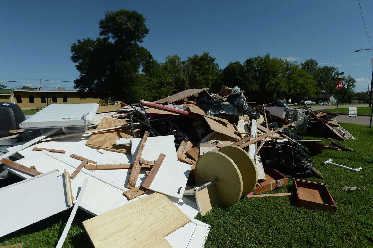 Large piles form alongside Lucas near S. 29th Street as residents throughout flooded Beaumont neighborhoods get to the work of gutting their damaged homes Tuesday. Photo taken Tuesday, September 24, 2019 Kim Brent/The Enterprise