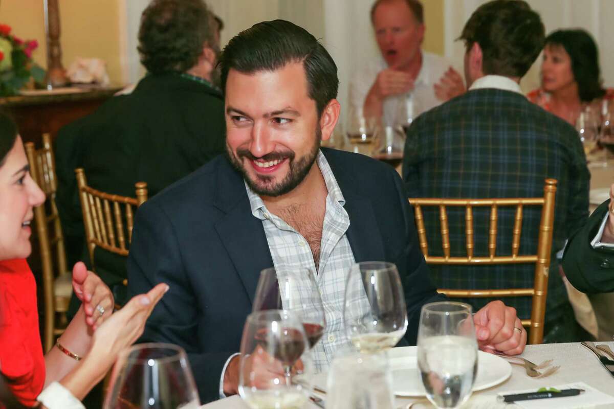 Guests enjoy food and drinks during the Houstonian Hoot'Nanny dinner to kick off 2019 Southern Smoke Festival. Shown: Aaron Bludorn, formerly of Cafe Boulud in New York, who is opening his own restaurant in Houston next year.