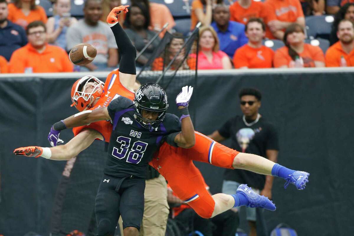 Sam Houston State Bearkats tight end Woody Brandom (85) can't get a hold of the ball over Stephen F. Austin Lumberjacks safety Trenton Gordon (38) during the first half of Battle of the Piney Woods at NRG Stadium on Saturday, Oct. 5, 2019.