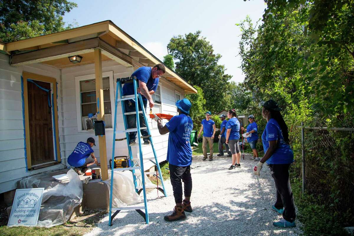 Republic Services employees in partnership with Avenue, volunteer in working repairs on a home near the north side of Houston on Saturday, Oct. 5, 2019.