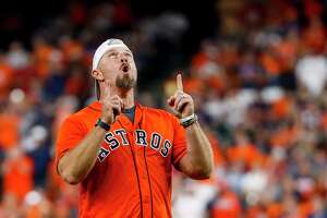 Former Astros player Billy Wagner celebrates after throwing out the ceremonial first pitch before Game 2 of the American League Division Series at Minute Maid Park on Saturday, Oct. 5, 2019, in Houston.