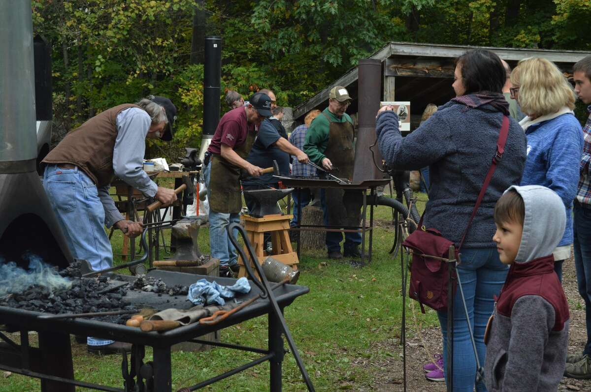 Midland families, visitors and residents flocked to Chippewa Nature Center on Saturday to experience the annual Fall Harvest Festival, which was filled with activities, demonstrations and crafts from 19th century farm life. From making apple butter, dipping candles and rope making to blacksmithing and school lessons from the 1870s – there was no shortage of activities for visitors of all ages to enjoy. Attendees were able to wander through the trails at Chippewa Nature Center, taking advantage of the dry, sunny weather, as they visited the schoolhouse, the homestead farm, gardens and more. Chippewa Nature Center is located at 400 S. Badour Road in Midland. To learn more about the center, visit https://www.chippewanaturecenter.org/ (Ashley Schafer/Ashley.Schafer@hearstnp.com)