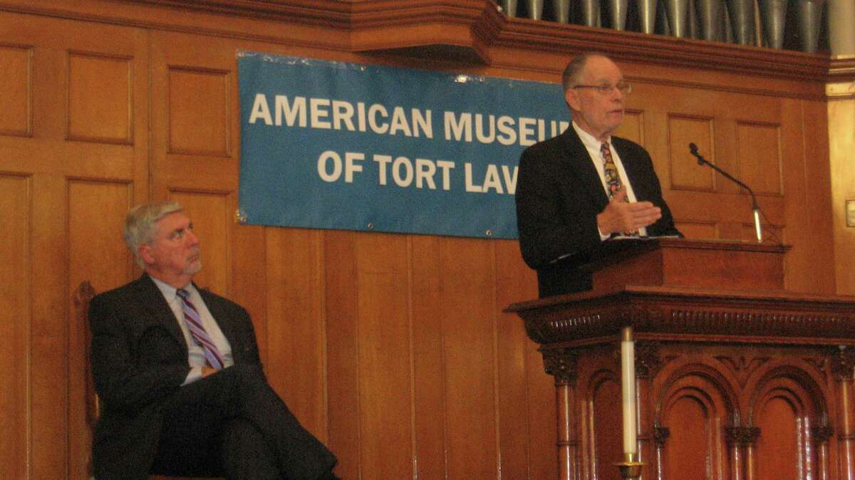 The American Museum of Tort Law held its first Tort Law Education Day on Saturday at the United Methodist Church in Winsted. Above, attorney Anthony Roisman addresses the audience, while executive director Richard Newman listens.