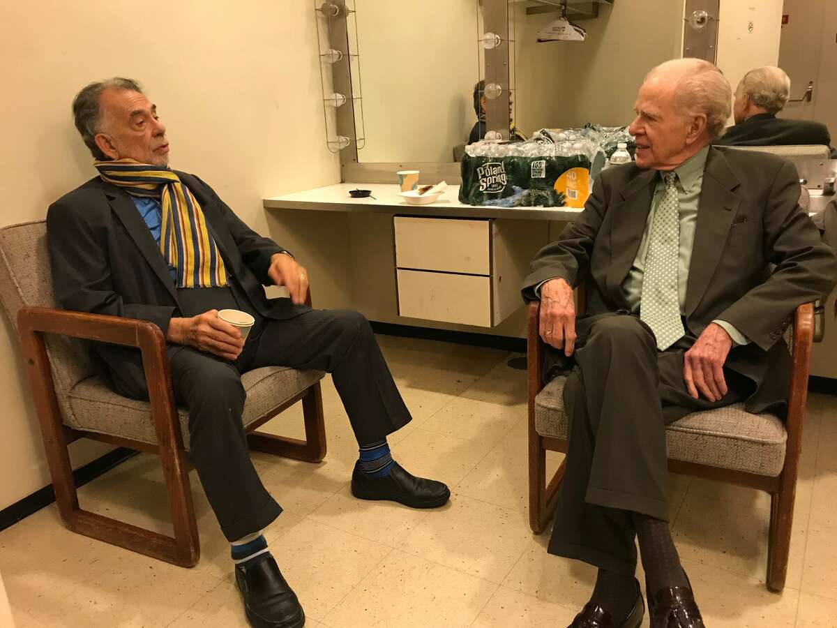 Director Francis Ford Coppola and author William Kennedy, who co-wrote the 1984 film "The Cotton Club," chat backstage before an event at The Egg on Sunday, Oct. 6, 2019.