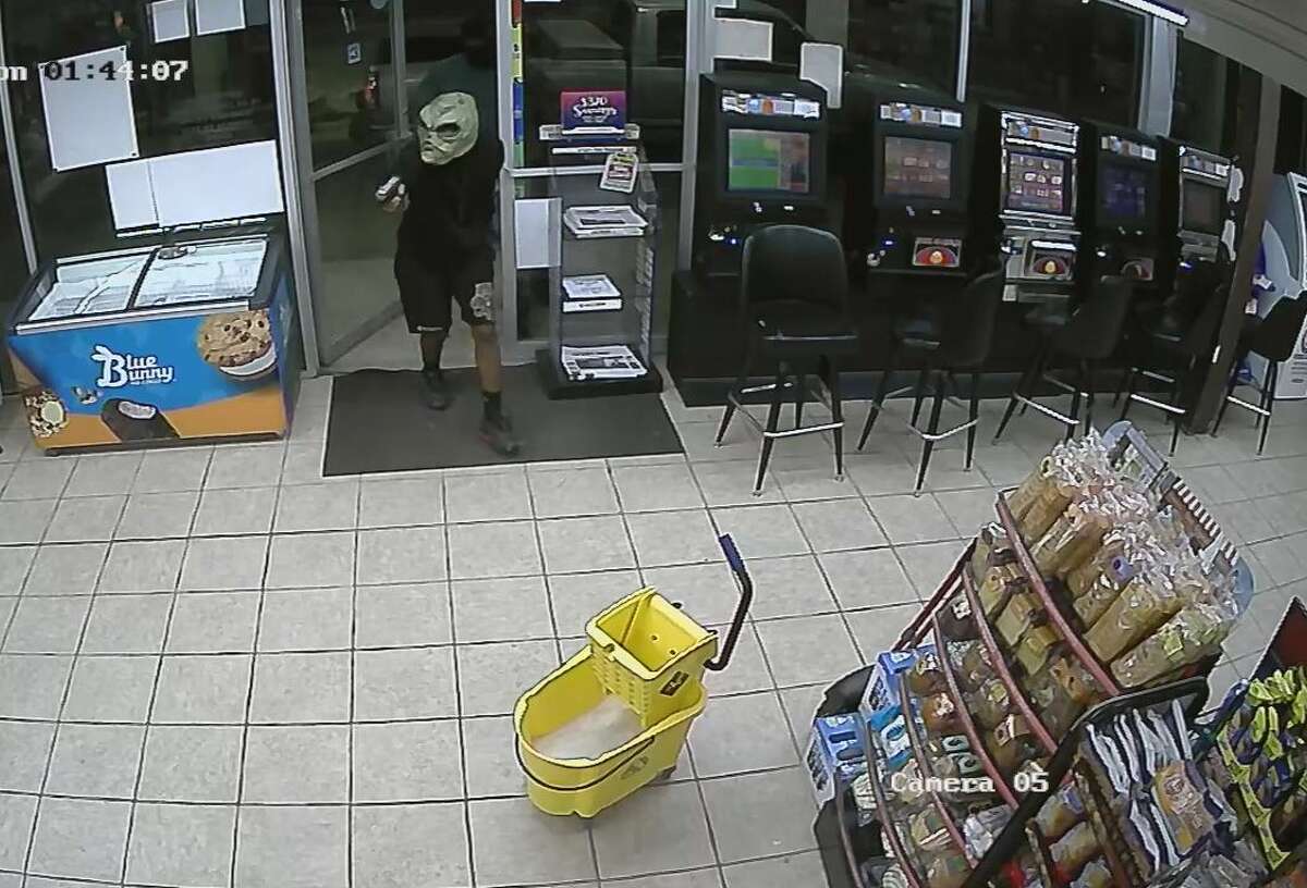 Surveillance stills released by the Houston Police Department show two men suspected in a deadly robbery shooting early Monday, Oct. 7, 2019, in the 2800 block of Reed Road.
