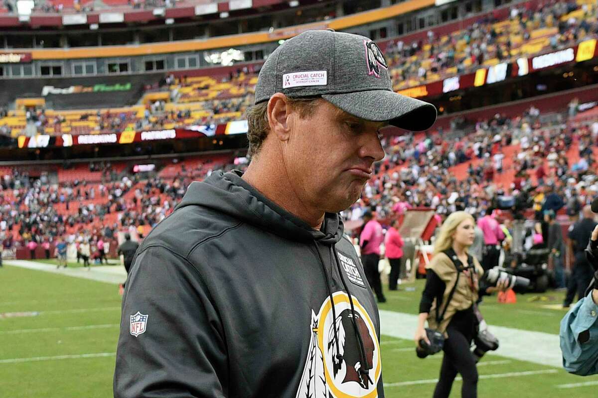 Washington head coach Jay Gruden leaves the field after an NFL football game against the New England Patriots, Sunday, Oct. 6, 2019, in Washington. The New England Patriots won 33-7. Gruden was fired as head coach of Washington on Monday after an 0-5 start to the sixth season of a tenure that featured only one playoff appearance.