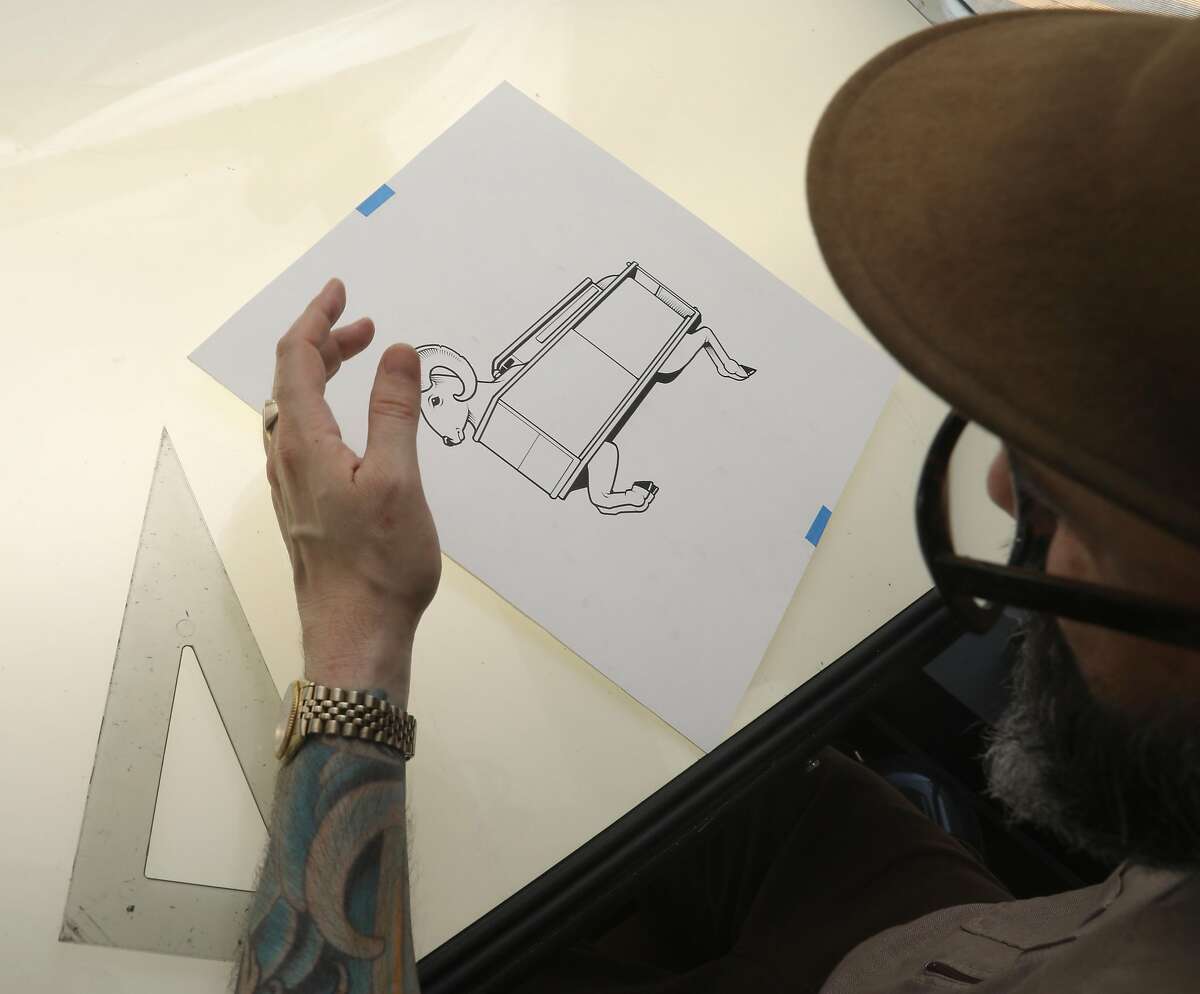 Visual artist Jeremy Fish works on sketches at his desk on Thursday, Sept. 19, 2019 in San Francisco, Calif.