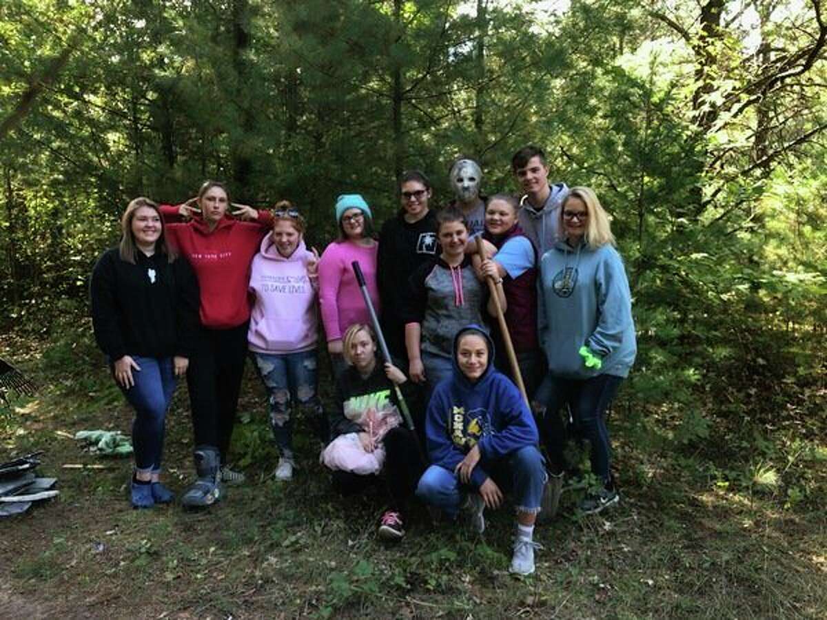 Sunday, Oct. 6, volunteers began prepping the Haunted Trail for 2019. The trail is set to open Oct. 12. Front row is Anna Busch and Miranda Cook, middle row is Skylar Bentley, Rayelynn Lewallen and MacKenzie Yeakey and back row is Jenna Little, Dylan Warner, Riley Pontz, Grace Lewallen, Holly Anger, Logan Yeakey, Gavin Hoisington. (Courtesy photo)