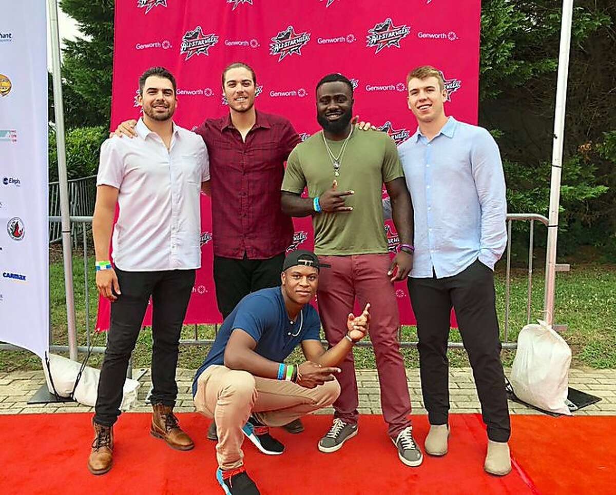 Giants minor-leaguer Tyler Cyr, left, poses with fellow Eastern League All-Stars (from left) Jonah Arenado, Jacob Heyward, Caleb Barager and Jalen Miller (kneeling) at an event before the July All-Star Game.