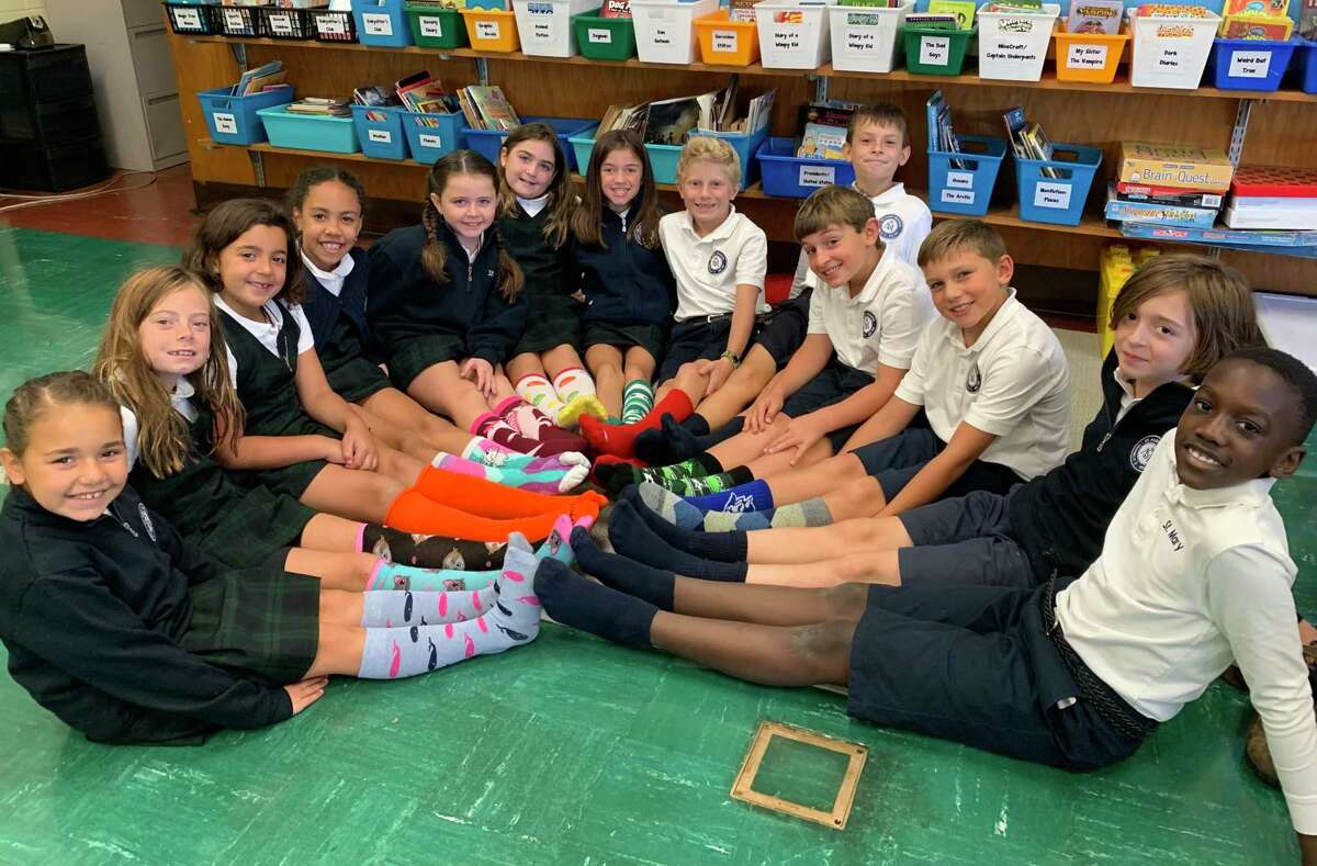 St. Mary School students wore crazy socks and raised $932 to help the people of the Bahamas recover after Hurricane Dorian. In addition, a St. Mary family matched the amount with a check for $1,864, being sent to go towards relief efforts.