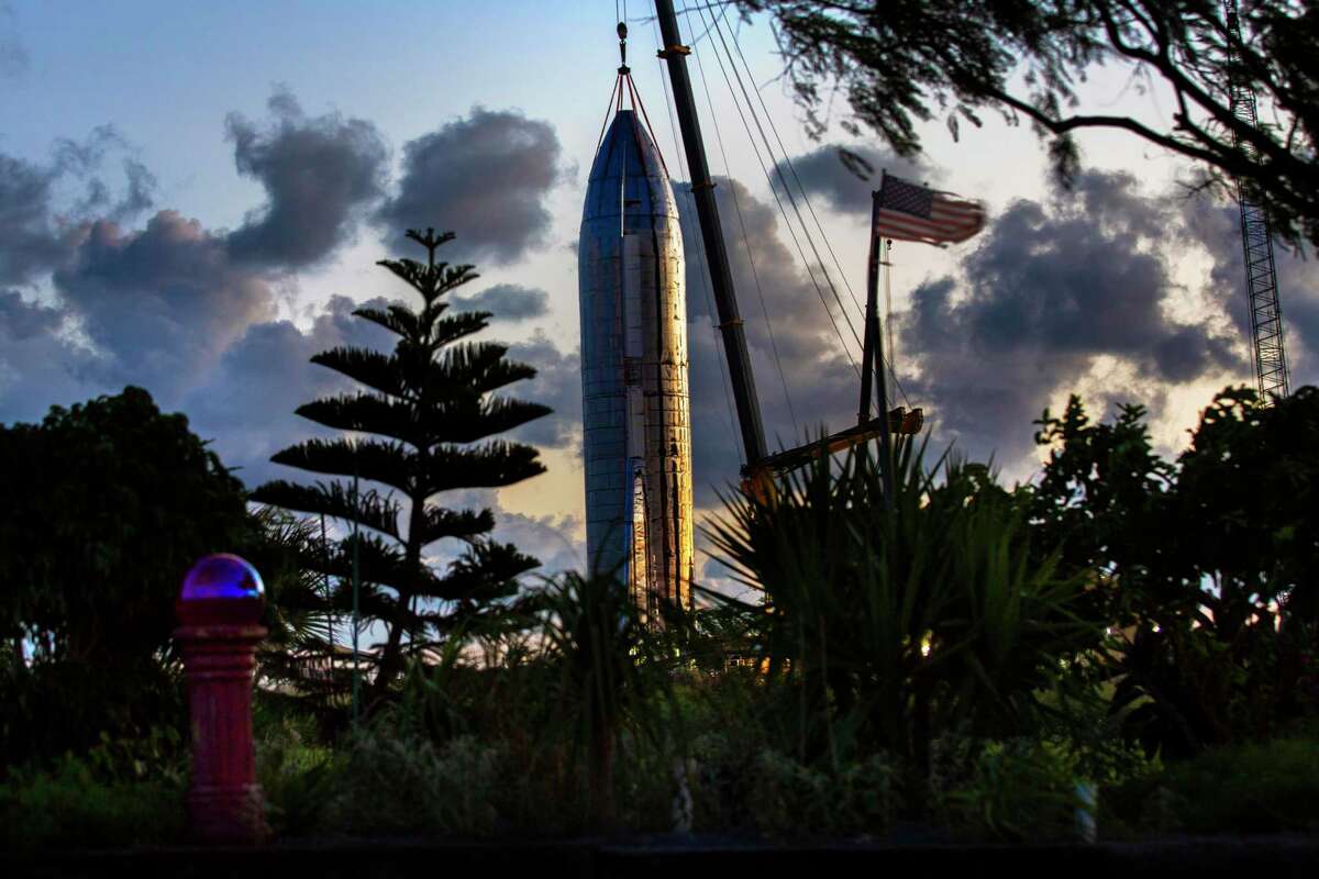 View of SpaceX’s Starship vehicle from the front yard of Maria Pointer on Friday, Sept. 27, 2019, in Boca Chica. The SpaceX’s prototype resembling an old sci-fi movie rocket of the 50s, will be fully reusable transportation system designed to service all Earth orbit needs as well as the Moon and Mars.